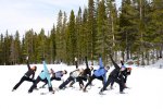yoga on a frozen lake in Rocky Mountain National Park